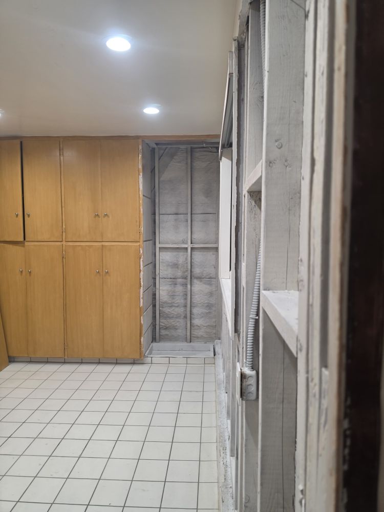 Room with affected materials removed, ready for clearance and rebuild